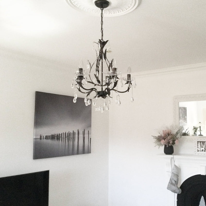 celine distressed gold shabby chic chandelier hanging in a lounge room